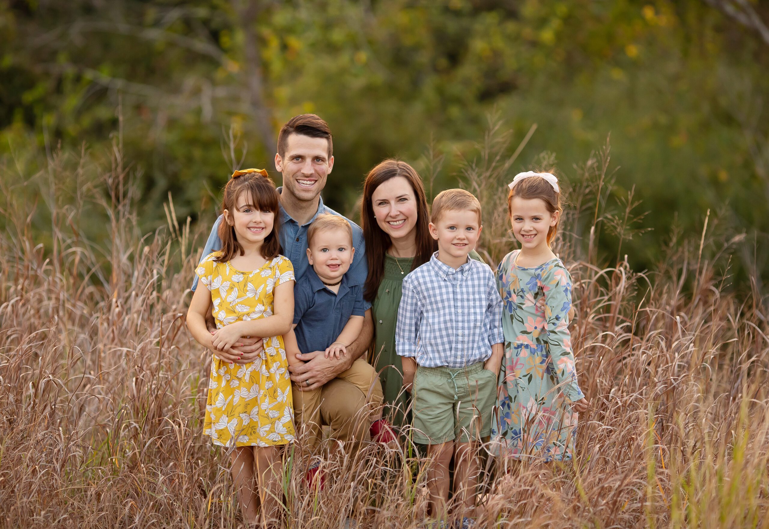 Family of five in colorful fall outfits during Highlight Ultra Mini Session
